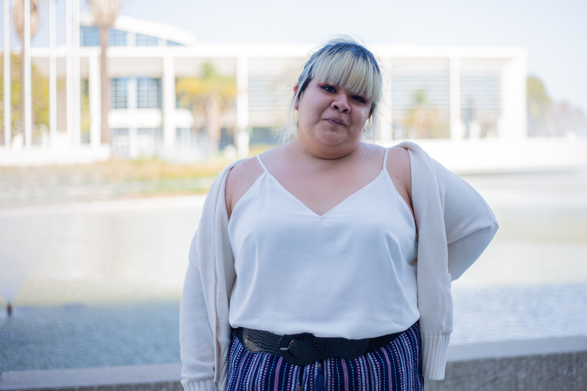 HRC student Alexandra Camacho poses in front of Cypress College pond. 