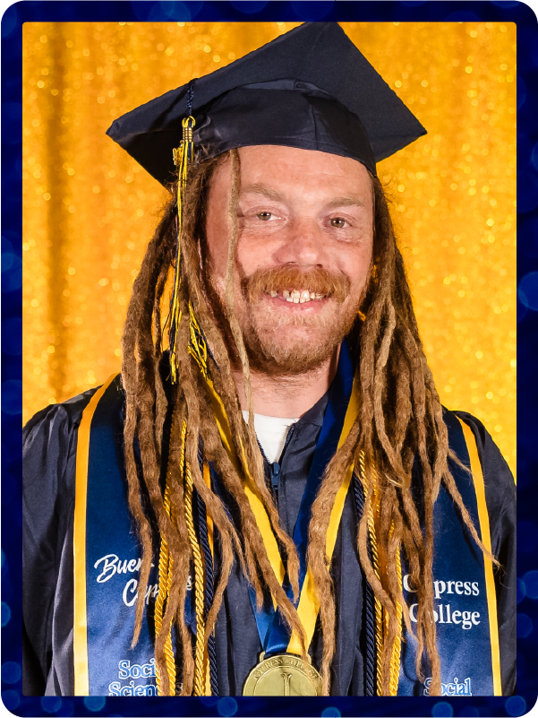 A portrait of Chase Curnow in commencement regalia