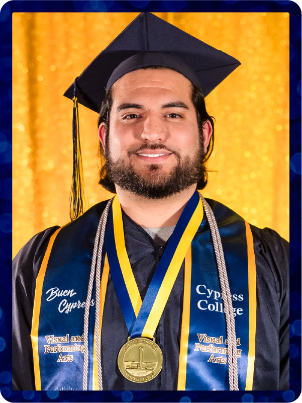Portrait of Fernando Lizarraga in commencement regalia