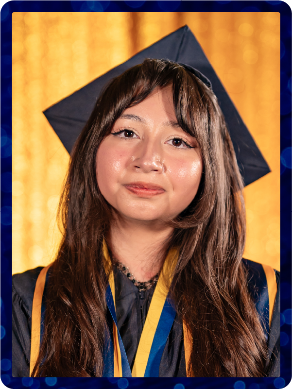Business student Mia Navarro in graduation regalia