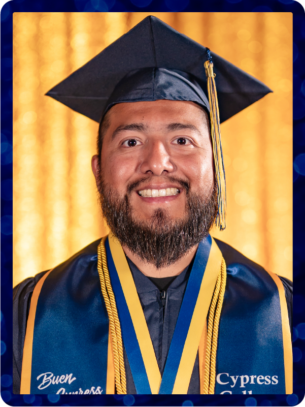 Portrait of Jesse Aguilar in graduation regalia