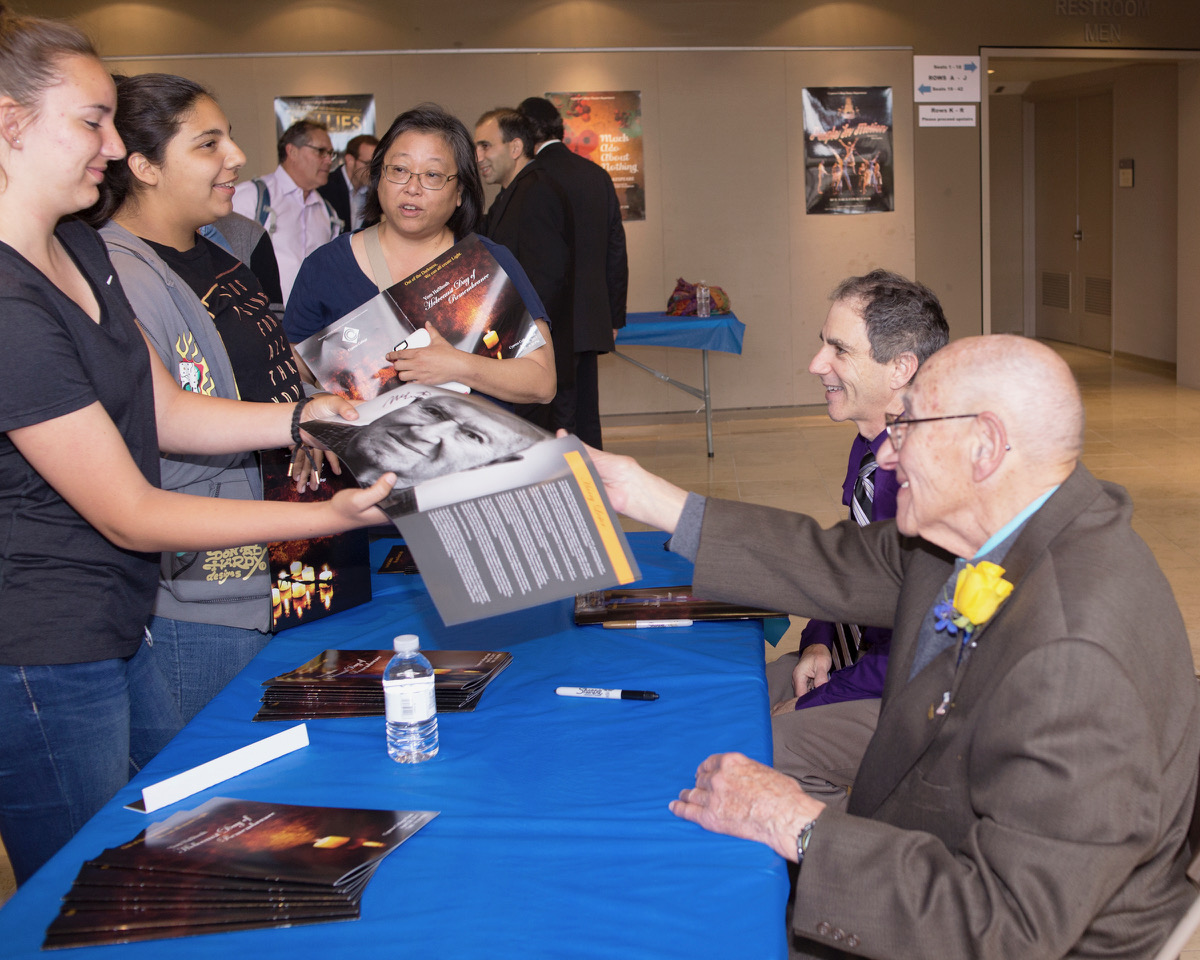 Harry Lester happily greets students from local schools