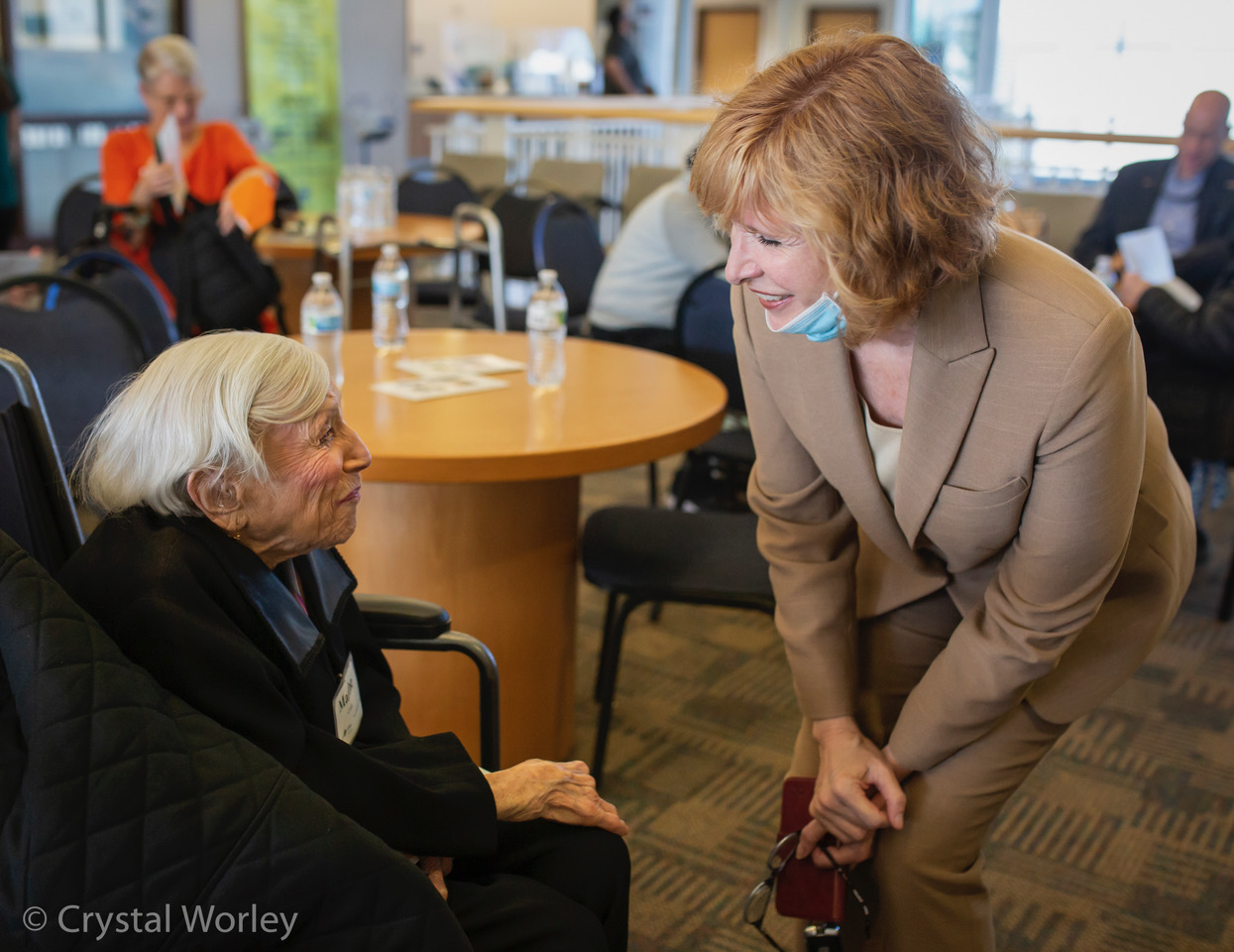 Cypress College President Emeritus Dr. JoAnna Schilling greats 103-year-old Survivor, Marthe Cohn.