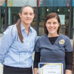 Student and alumna at scholarship reception