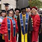 A group of people in regalia at graduation
