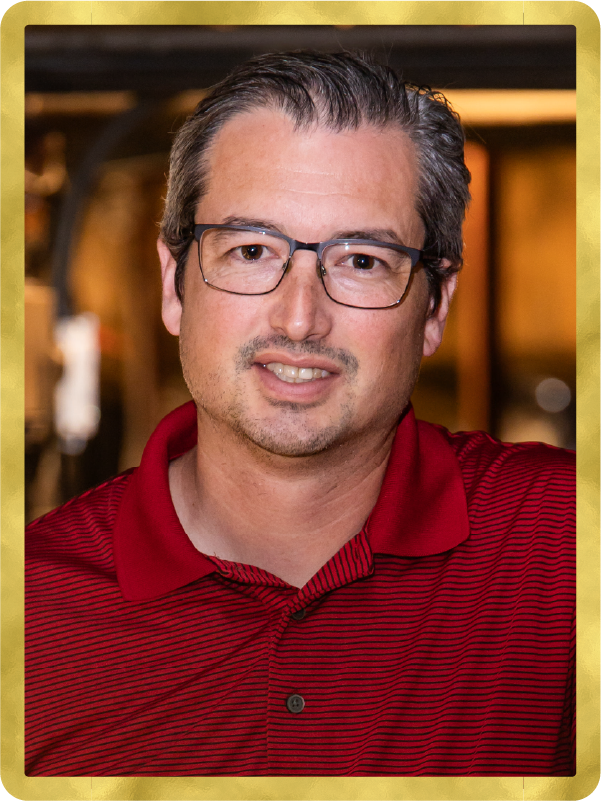 Portrait of Ray Gibson in red polo shirt