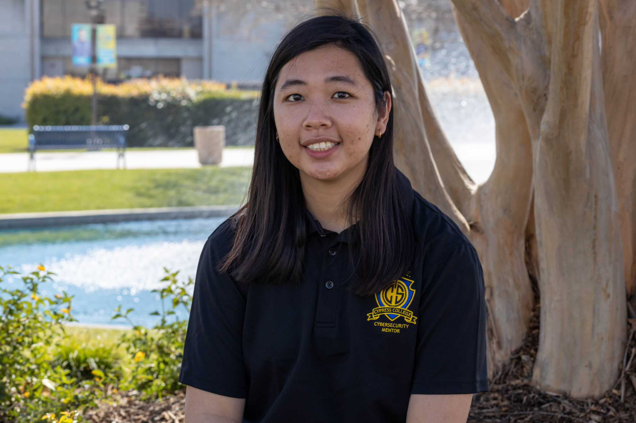 Dual Enrollment's Samantha Wang smiling with pond in background