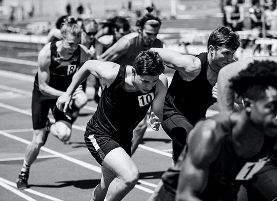 Athletes running on a track