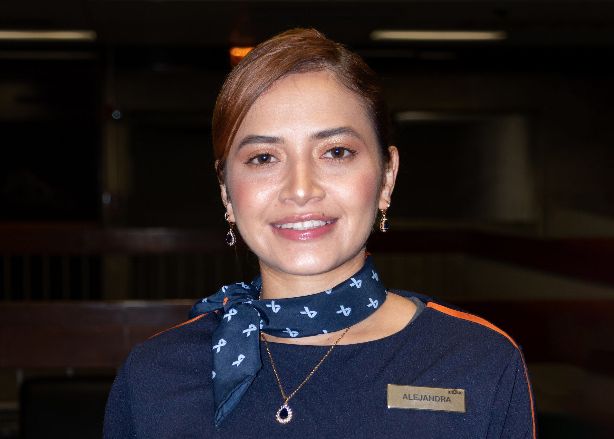 Alejandra Bonilla poses in a JetBlue uniform.