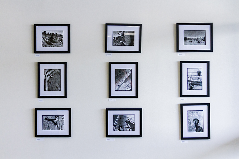 Framed photographs on a wall