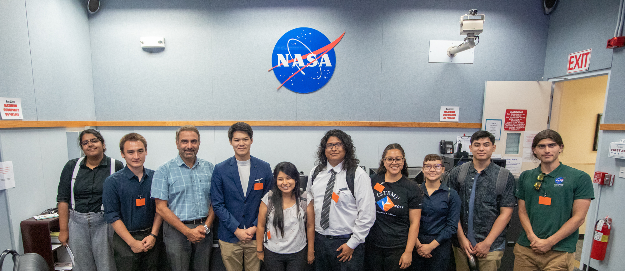 Students standing in room at NASA