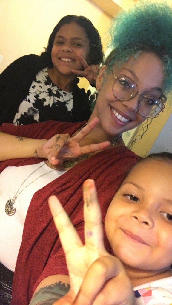 CYProud Amber Winey, candidate for an Addiction Studies certificate, with her daughters