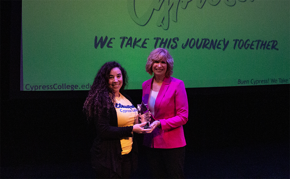 Dr. JoAnna Schilling presents Ashley Berry with the North Star award