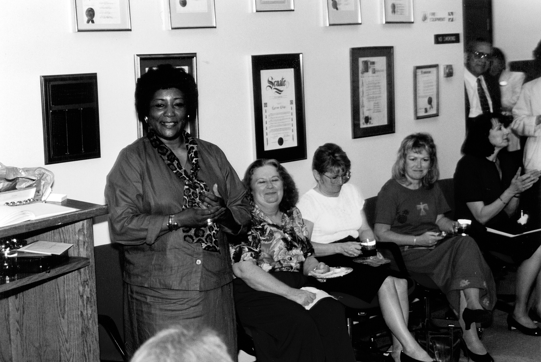 Dr. Christine Johnson speaks at a gathering commemorating her departure from Cypress College in 1998.