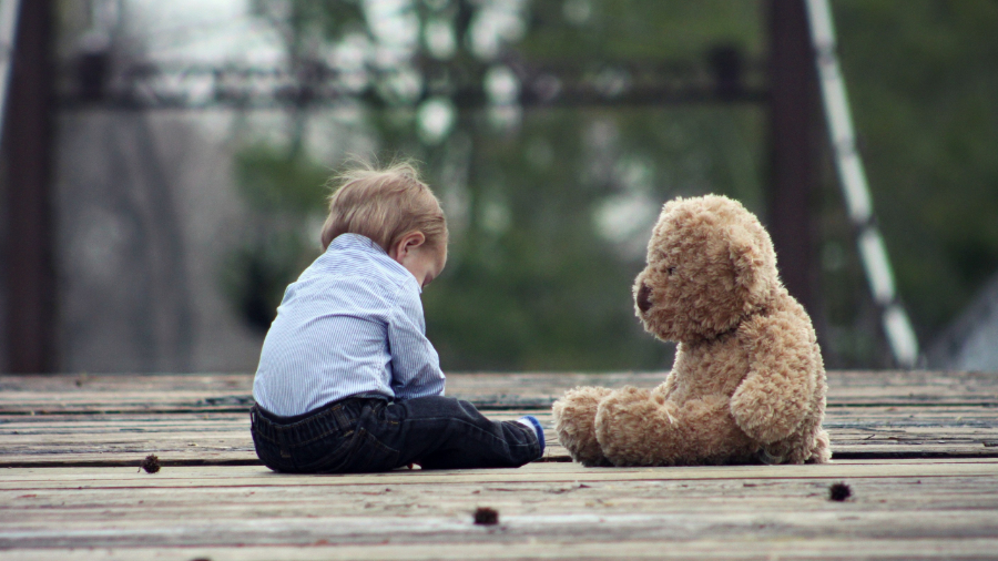 Child with Teddy Bear