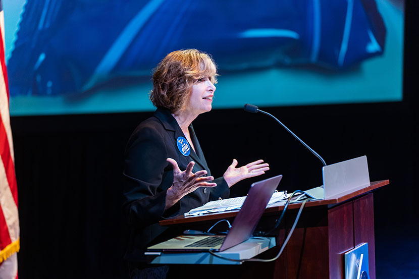 President JoAnna Schilling speaking at podium