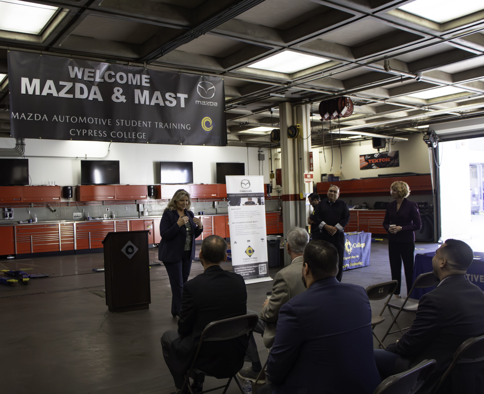 Members of Mazda North America Operations and the president, vice president of instruction, and faculty from Cypress College.