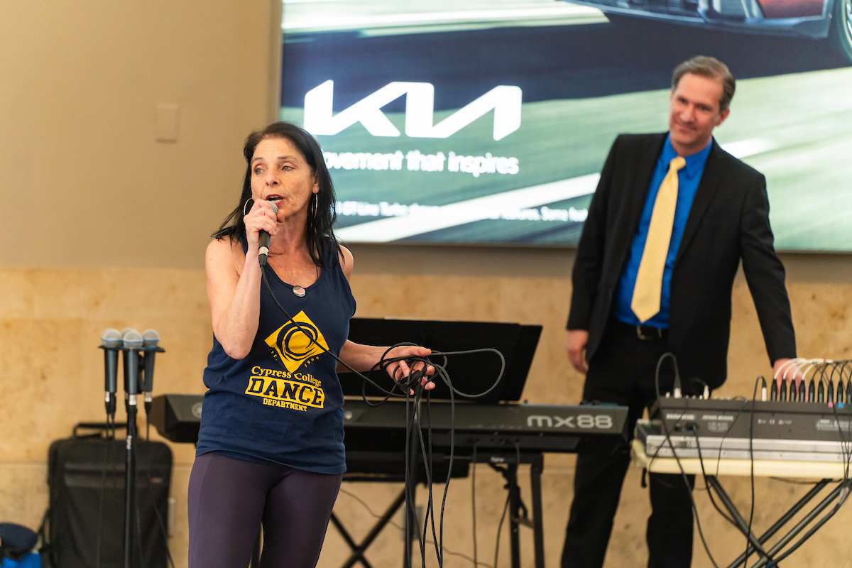 Maha Afra and Bradley Hampton introduce student performers.