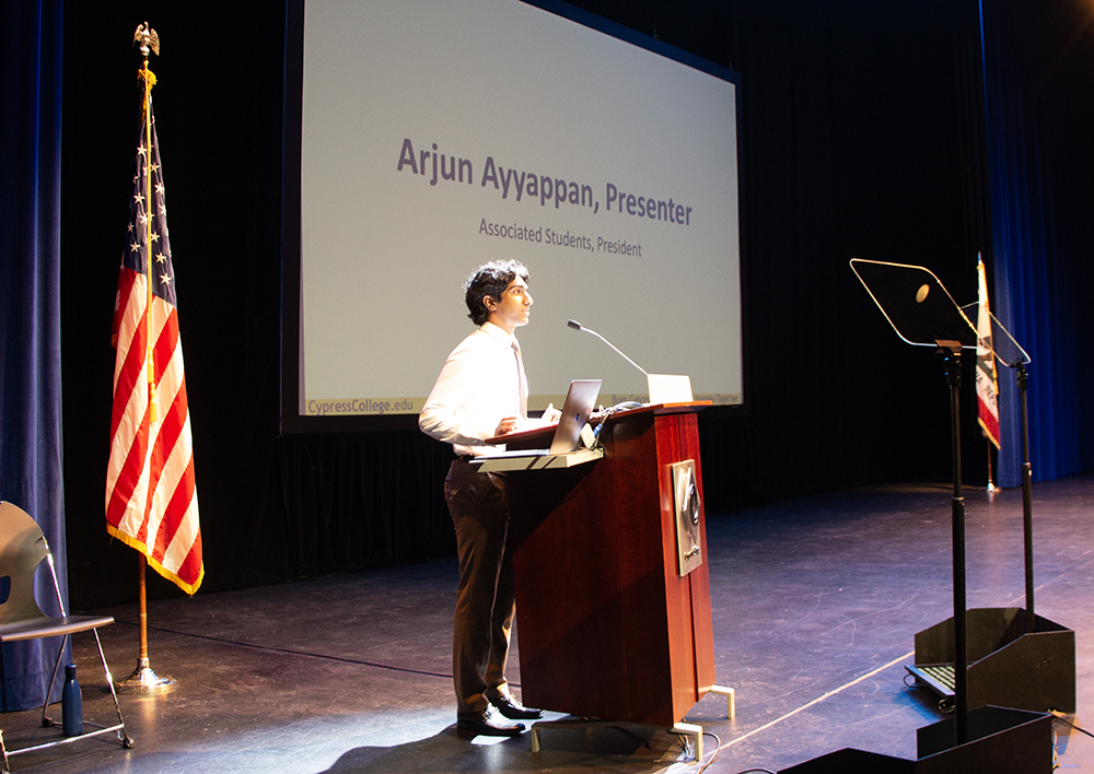 Arjun Ayyappan speaks to faculty and staff in the audience at Fall 2023 Opening Day