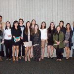 Group of Scholarship Award Ceremony attendees smiling.