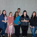 Group of Scholarship Award Ceremony attendees smiling.