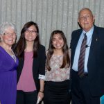 Group of Scholarship Award Ceremony attendees smiling.