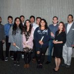 Group of Scholarship Award Ceremony attendees smiling.