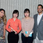 Group of Scholarship Award Ceremony attendees smiling.