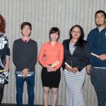 Group of Scholarship Award Ceremony attendees smiling.