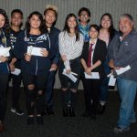 Group of Scholarship Award Ceremony attendees and Dave Okawa smiling.