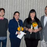 Group of Scholarship Award Ceremony attendees smiling.