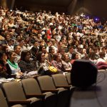 Audience of high school students for Senior Day
