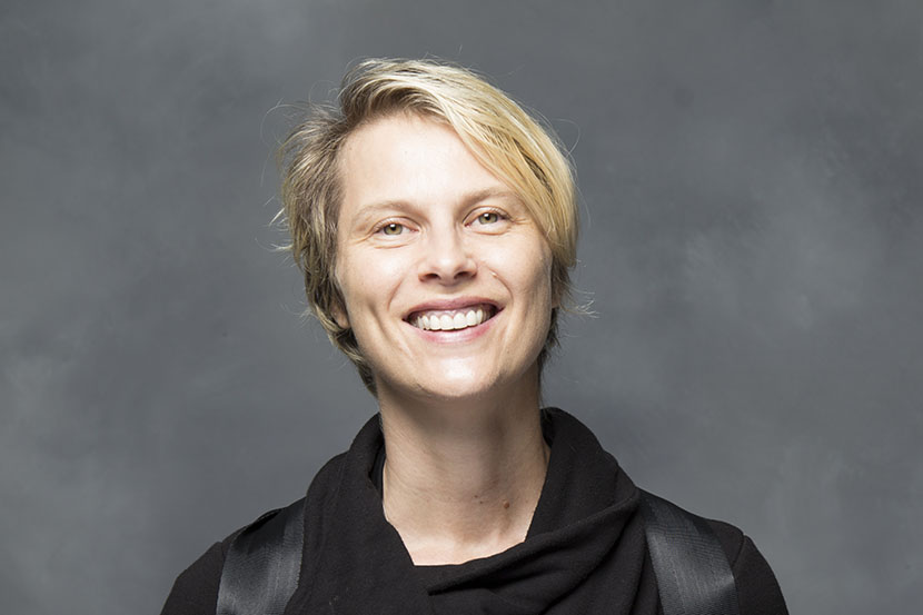 Professor Kati Angelov smiling with a black shirt.