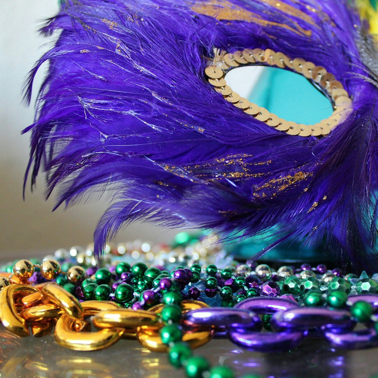 Mardi Gras mask and beads