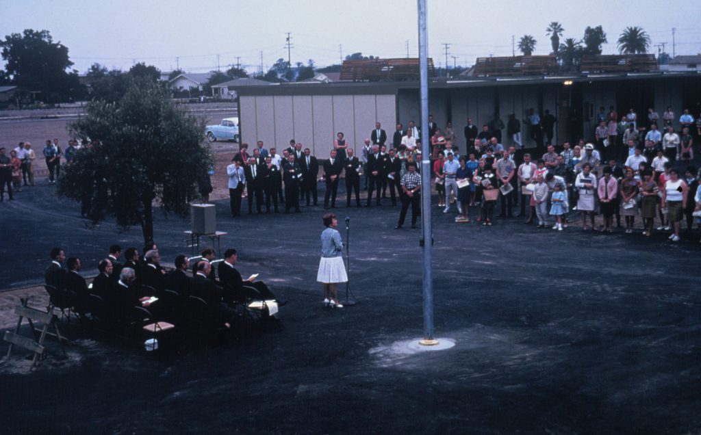 Cypress College's first opening day, included a dedication ceremony at the flag.