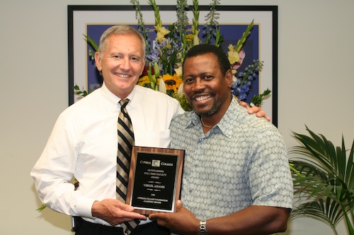 Professor Adams and Dr. Kassler holding plaque