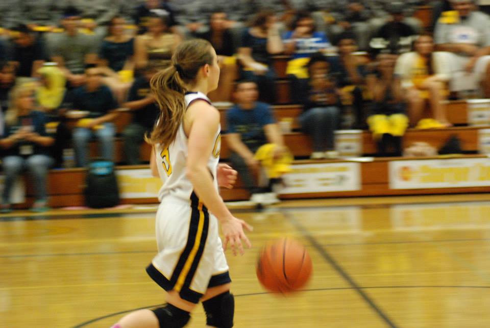 Women's basketball player on court